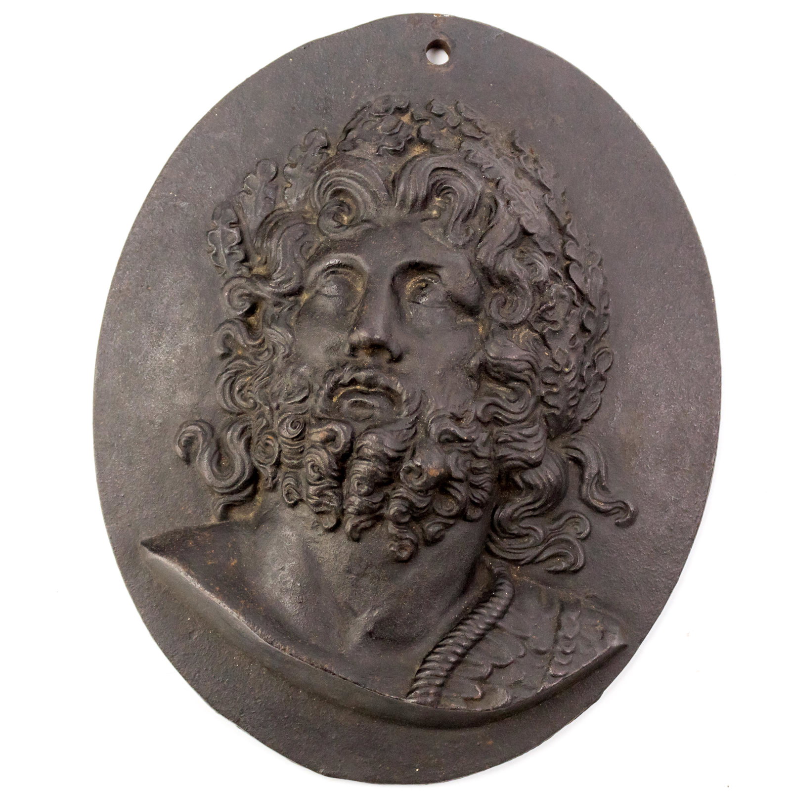 Greek Cast Iron Cameo Medallion Relief Plaque: Exquisite antique Neoclassical cast iron relief of Greco Roman style face. Features stunning details of the man's face, beard and leaves. Retaining old shipper's label on verso that reads “Shipped B