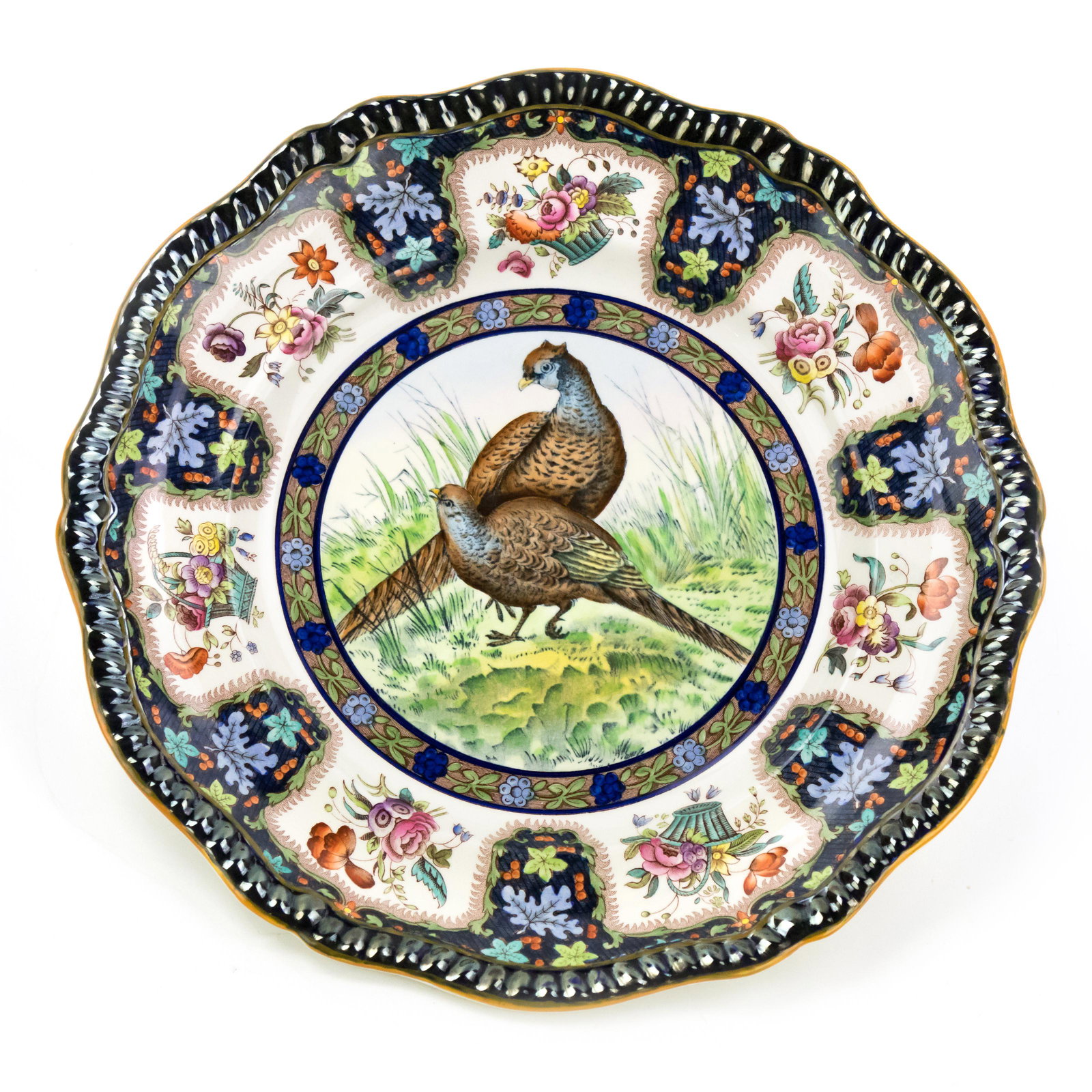 Copeland Spode England Pheasant No.6 Dinner Plate: Copeland Spode English pheasant dinner plate featuring dark iridescent trim and floral bird motif. Marked on underside. Measures 10 in. x 1 in. Good condition with normal surface wear. Hill Auction Ga