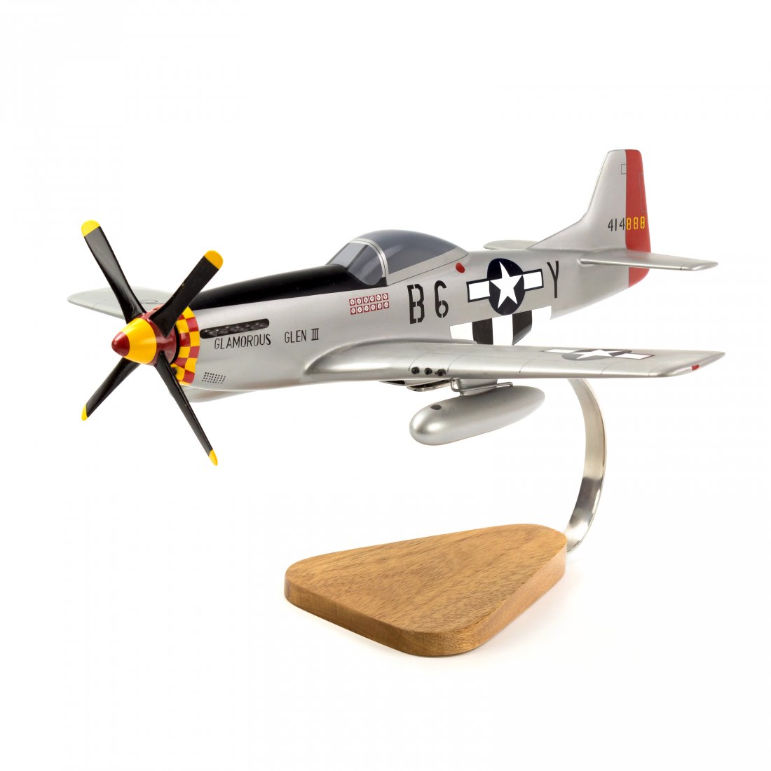 Chuck Yeager SIGNED Glamorous Glen III Model Plane: A vintage autographed replica desk set model of the historic P-51 Mustang fighter airplane piloted during World War II by pioneering Right Stuff aviator Chuck Yeager (b.1923). Bears signature to wing 