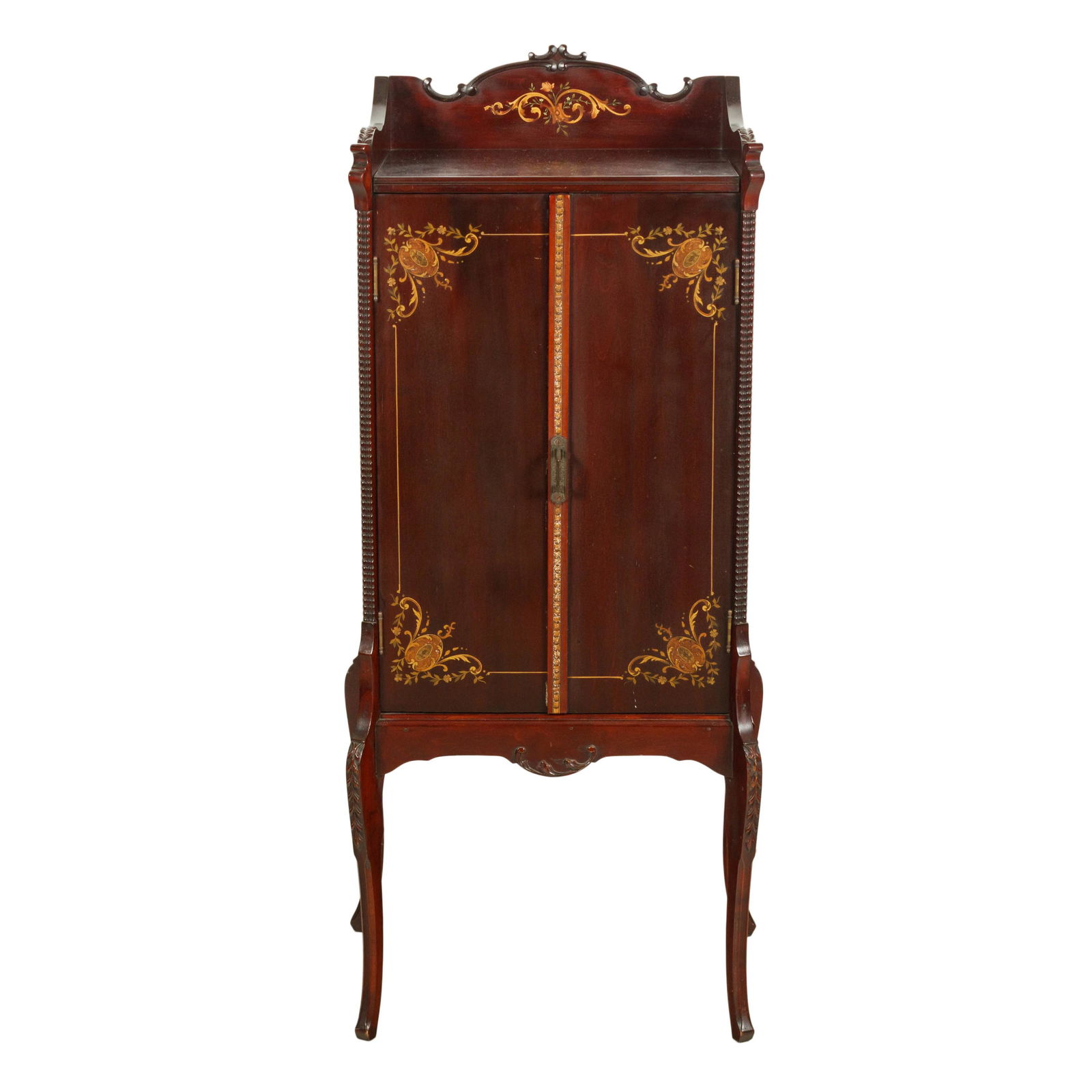 Victorian Antique Mahogany Sheet Music Cabinet: Elegant design with faux wood inlay finish. Double doors open to reveal an interior fitted with six drawers. Affixed brass plaque with 1892 patent date. Good to fair condition with mild surface wear,