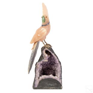 Rose Quartz Carved Bird & Amethyst Geode Sculpture: Carved rose quartz cockatoo parrot sculpture with metal feet, fixed to large raw amethyst stone. Additional semi precious stones, with light green beak, blue ring around neck and blue and peach tale