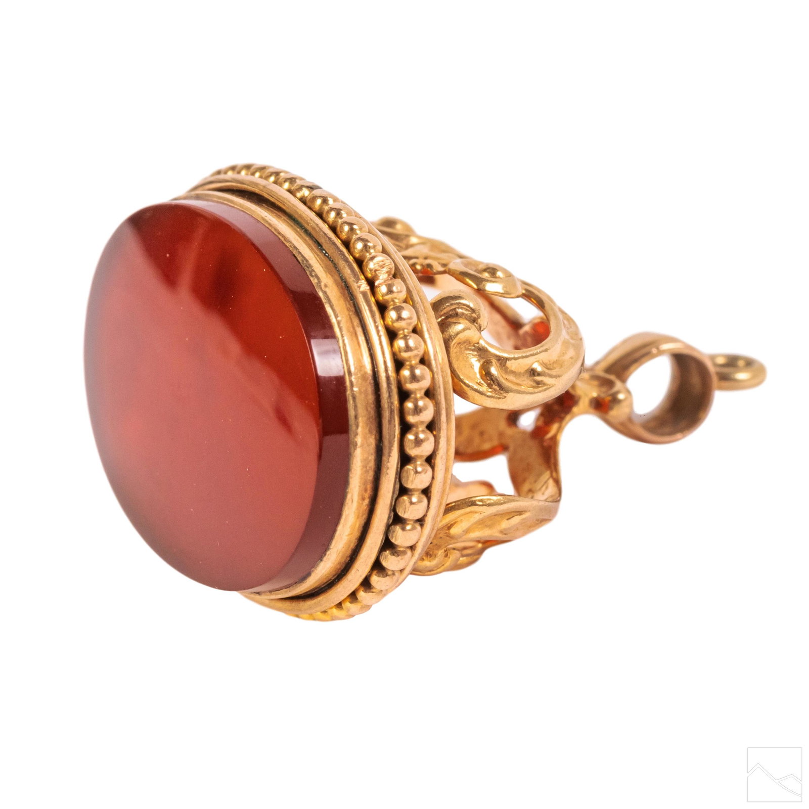 10K Gold Victorian Fine Carnelian Reticulated Fob: Fine antique gold and carnelian fob. A reticulated crown like form with ovular bezel set 22mm x 15mm carnelian cabochon. Measures 29mm x 24mm x 18mm. Unmarked but tested 10k. Weighs 7.1 grams. Good ov