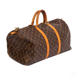 Louis Vuitton LV Monogram Duffel Bag Keepall 45: Louis Vuitton (French). LV Bandouliere Keepall 45 canvas duffel bag. Lightweight roomy bag featuring double leather wrapped handles, golden color metal hardware with cotton textile lining. Good condit