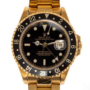 Rolex Solid 18K Gold GMT Master #16718 Sport Watch: Rolex (Swiss). Men's vintage GMT Master watch with working automatic mechanical movement housed in a solid 18K yellow gold case. Comes with oyster bracelet and deployment buckle. Dial is black, with