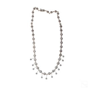 Modernist Platinum and 3 CTTW Diamond 16" Necklace: Fine designer style Modernist platinum and diamond necklace. Hand made circular links with twisted cable embellishments and a central third with bezel set round cut diamonds, and dangling diamonds