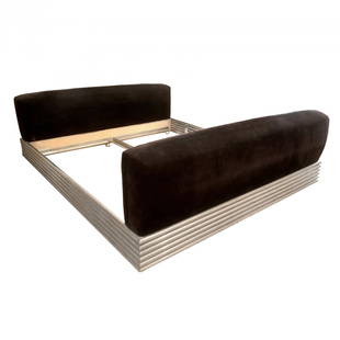 Brueton Chrome Radiator King Sz Bed Mid Century Modern: Brueton Italian Mid Century Modern bed with ribbed chrome base and dark upholstered head and foot board. Fits a king size mattress, measuring 80 in. x 78 in. Bed measures 84 in. 95 in. Fair