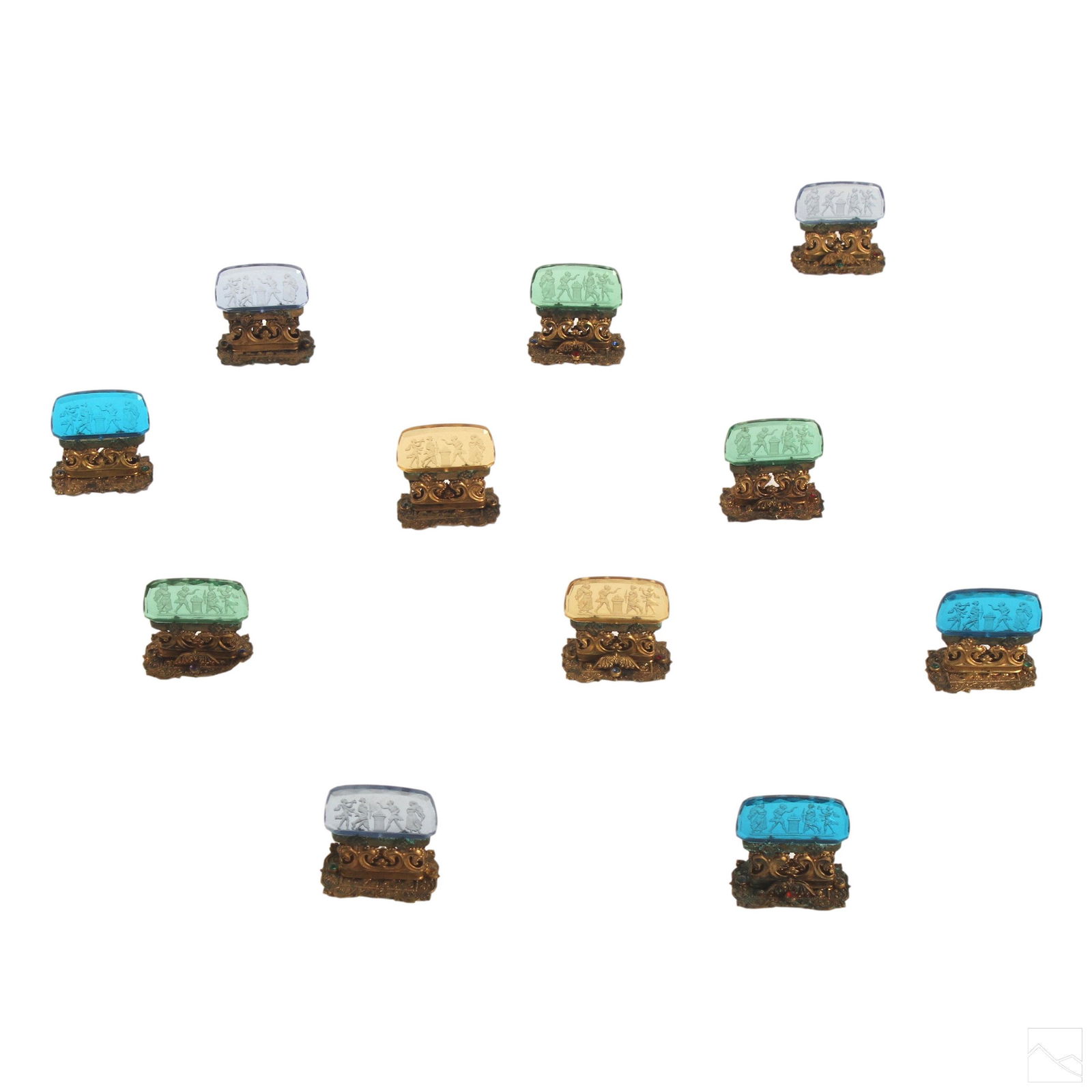 Austrian Czech Intaglio Place Card Holders Group: Collection of 11 antique Czech glass place cardholders. Features etched figural intaglio scenes, fixed to an ornate gilt metal base, embellished with Austrian crystals. Includes two amber, three light