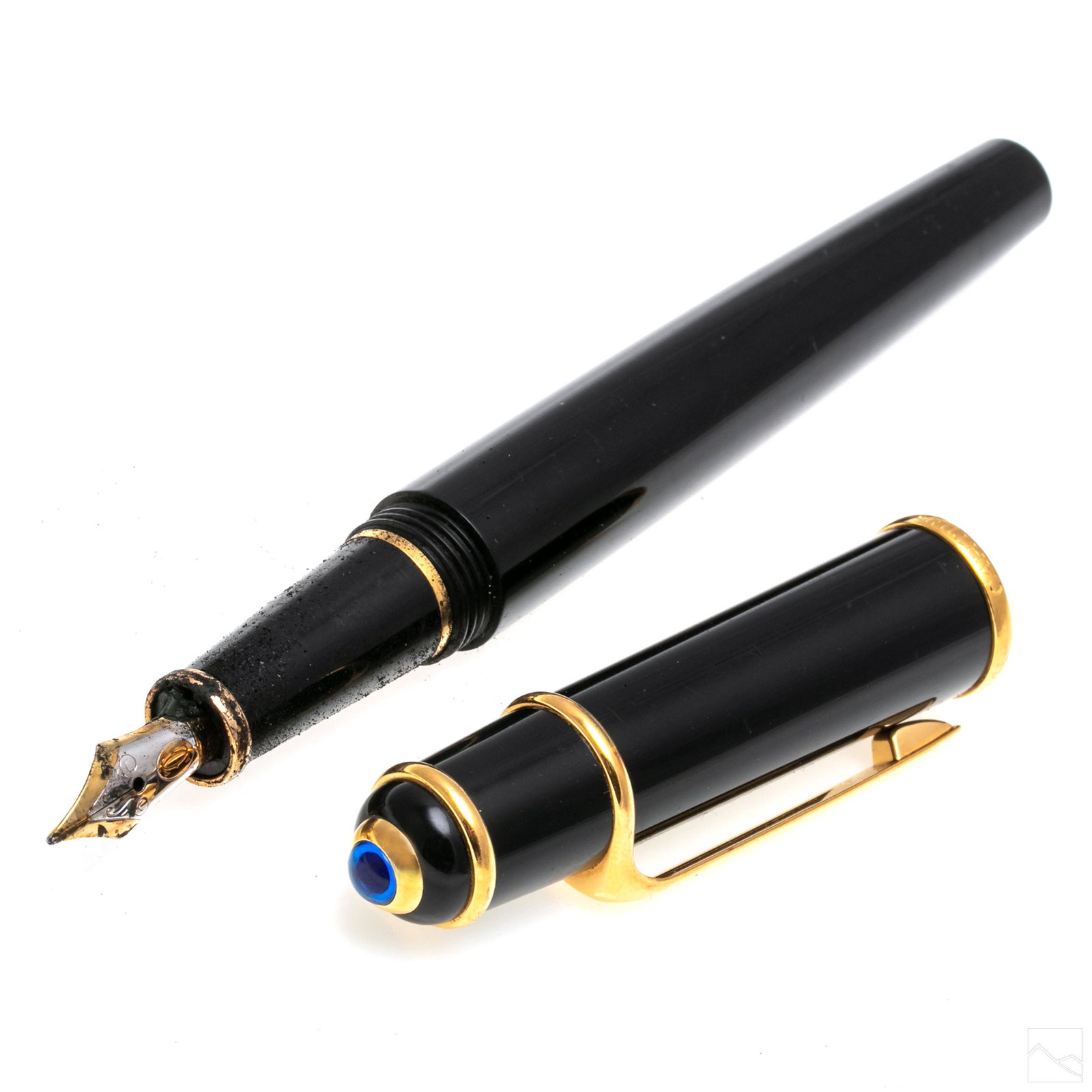 Cartier 18K Gold Nib & Black Lacquer Fountain Pen: Cartier fountain pen with 18k gold nib and black lacquer body and gold plated metal sections. Capped with blue synthetic sapphire. Marked 18k Cartier. Measures 5.5 inches. SHIPPING Hill Auction Galler