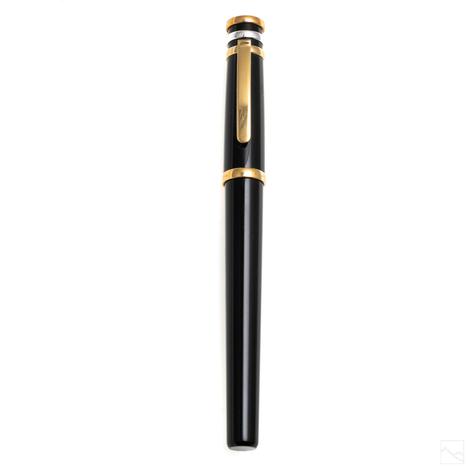 Cartier 18K Gold Plate Black Roller Ballpoint Pen: Cartier roller ballpoint pen with 18k gold plated metal components, black nib, black lacquer body, and gold plated metal sections. Marked Cartier. Measures 5.5 inches. SHIPPINGHill Auction Gallery wil