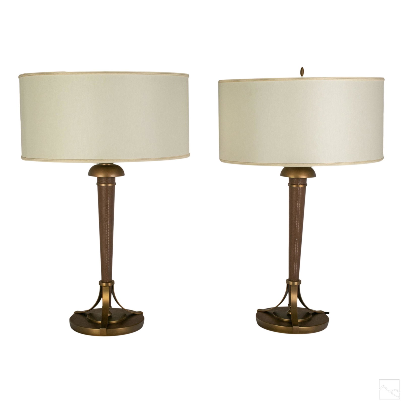 Pair of Andre Arbus for Baker Couture Table Lamps: Pair of signed Andre Arbus designed table lamps for Baker. "Couture" brushed bronze finish with hand stitched taupe brown leather centers. Double socket tops with pull chain switches. Each signed with