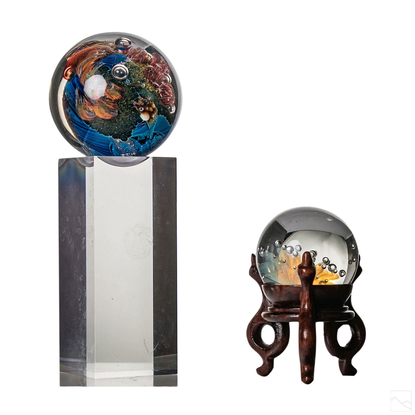 J Simpson Mini Sphere Art Glass Paperweights Group: Two vintage studio art glass marble, paperweight spheres. Includes (1) 2 in. glass sphere with Lucite display, signed JS, Josh Simpson (American, born 1949). And (1) 1 1/2 in. unsigned studio art glas