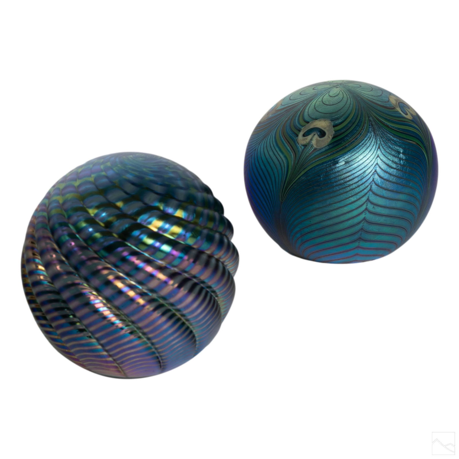 Iridescent Studio Art Glass Vintage Paperweights: Collection of two vintage iridescent studio art glass paperweights. Includes (1) 2 1/4 in. signed Orient & Flume, #4377, 1979. (1) 2 1/2 in. signed DBG 1989. SHIPPINGHill Auction Gallery will offer in