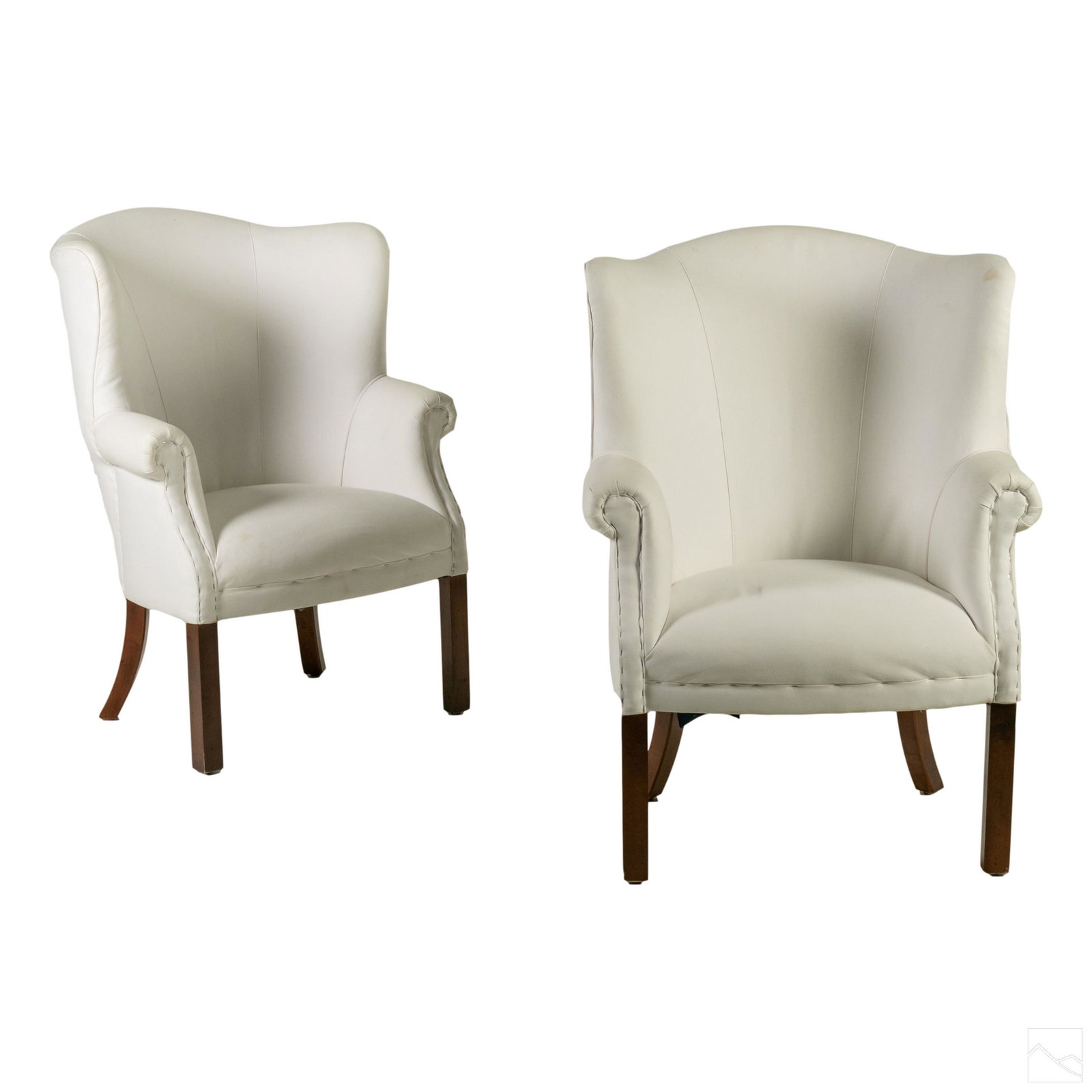 Ralph Lauren 42" Linen Upholstered Wing Chair Pair: Pair of Ralph Lauren wing chairs. Featured with original white linen under-upholstery. Mahogany wood legs. SHIPPING Hill Auction Gallery will not ship. Gallery will refer a local shipper for internati