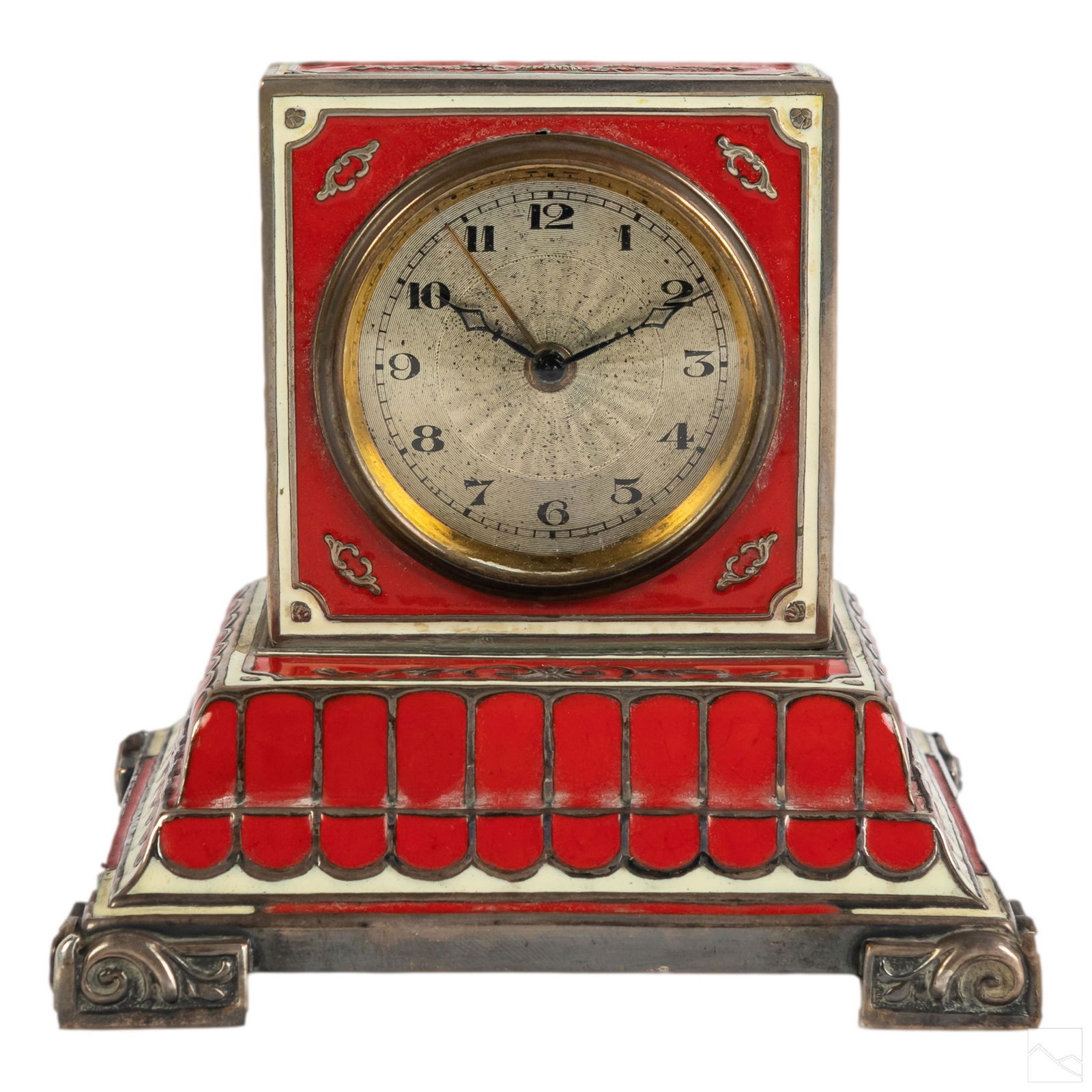 German Antique Silver and Enamel Alarm Desk Clock: Antique German silver and enamel desk clock. Winding feature with alarm setting. Silver wreath and floral motif with bright red enamel. Brass back and bottom. Untested. SHIPPINGHill Auction Gallery wi