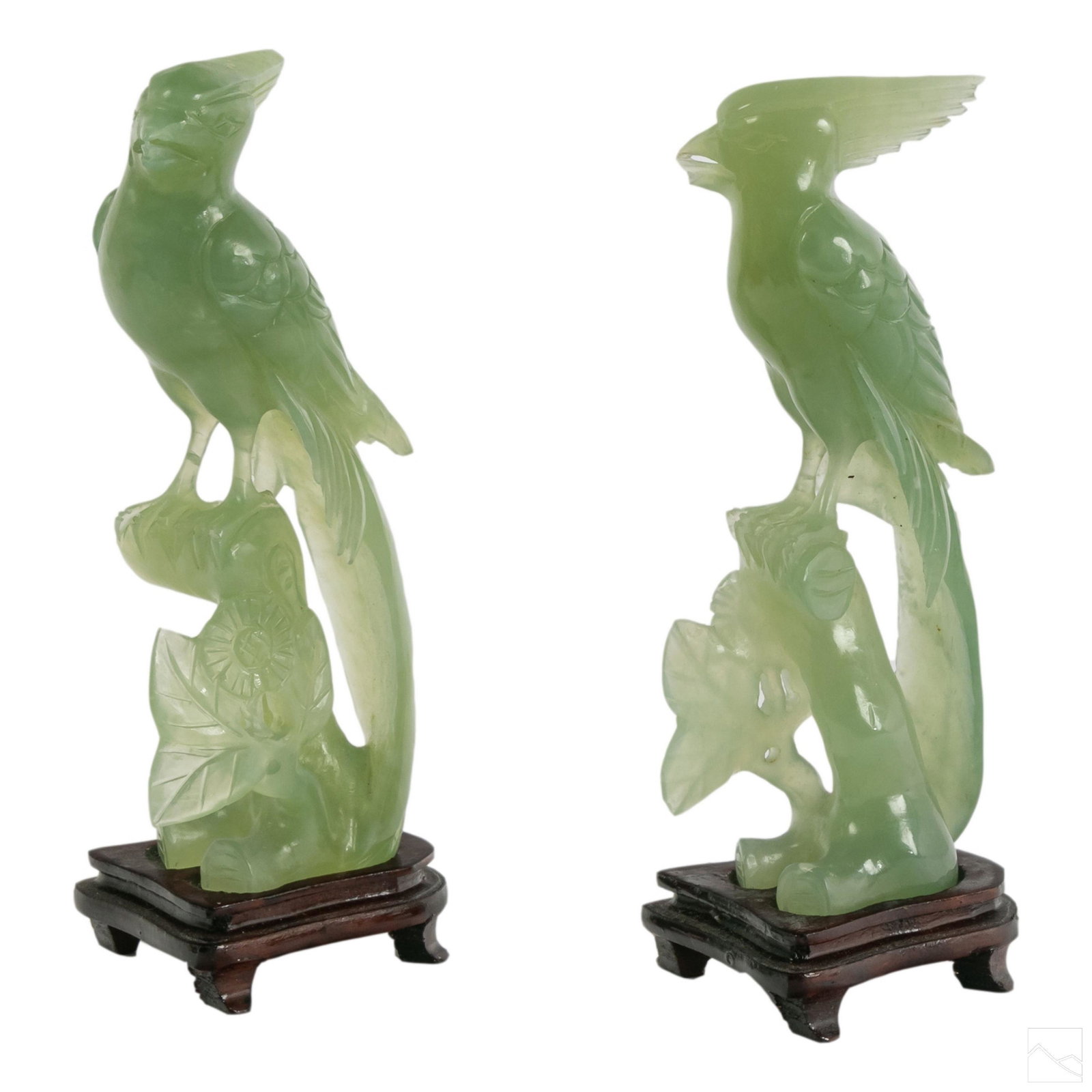 Chinese Pair Antique Carved Jade Birds with Flora: Pair of antique Chinese jade birds with flora. Features detailed flowers, and long feather tails. Includes fitted wood stands. SHIPPING Hill Auction Gallery will offer in-house continental USA shippin