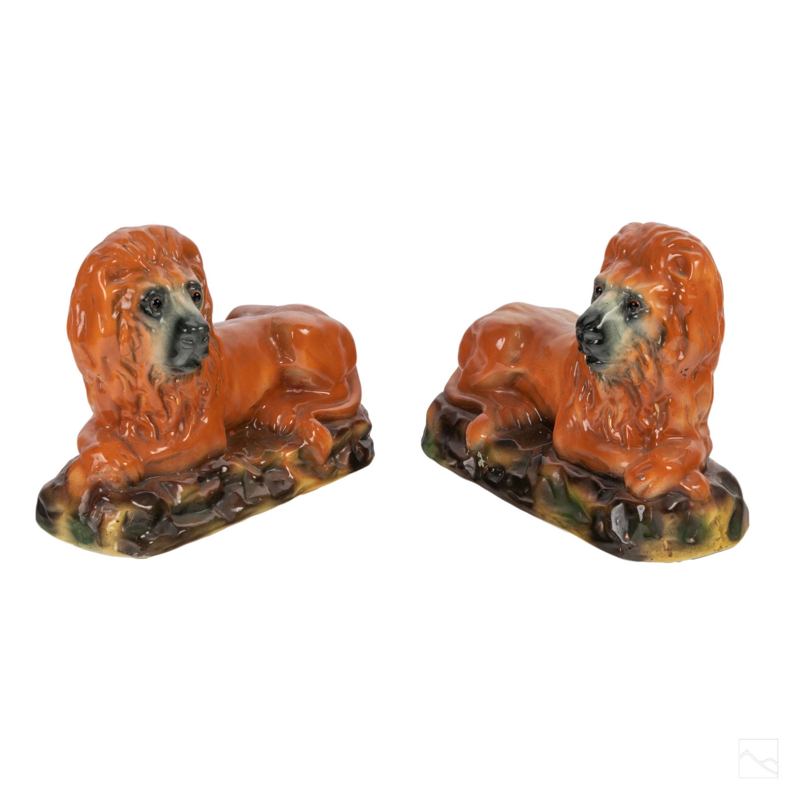 English Staffordshire English Pottery Lion Figures: Pair of antique Staffordshire pottery figurines. Recumbent lions in mirrored poses. Each fitted with glass eyes. Brown decorated bodies with green mottled bases. Unsigned. SHIPPING Hill Auction Galler