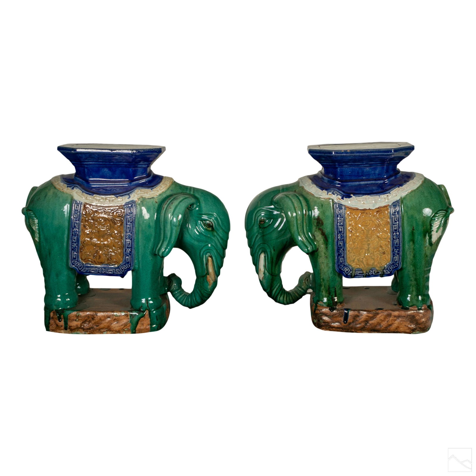 Chinese Sancai Porcelain Elephant Garden Seat Pair: Pair of antique glazed Chinese Sancai porcelain elephant form garden seat stools. Large earthenware sculptures decorated in rich deep green, cobalt blue, tan, and other colors, with thick glaze and co