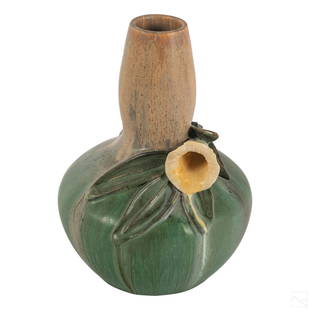 Mary Pratt for Ephraim American Art Pottery Vase: American art and crafts style vase by Ephraim Pottery signed by artist Mary Pratt. Features a white flower wrapped around a brown and green body. SHIPPINGHill Auction Gallery will offer in-house conti