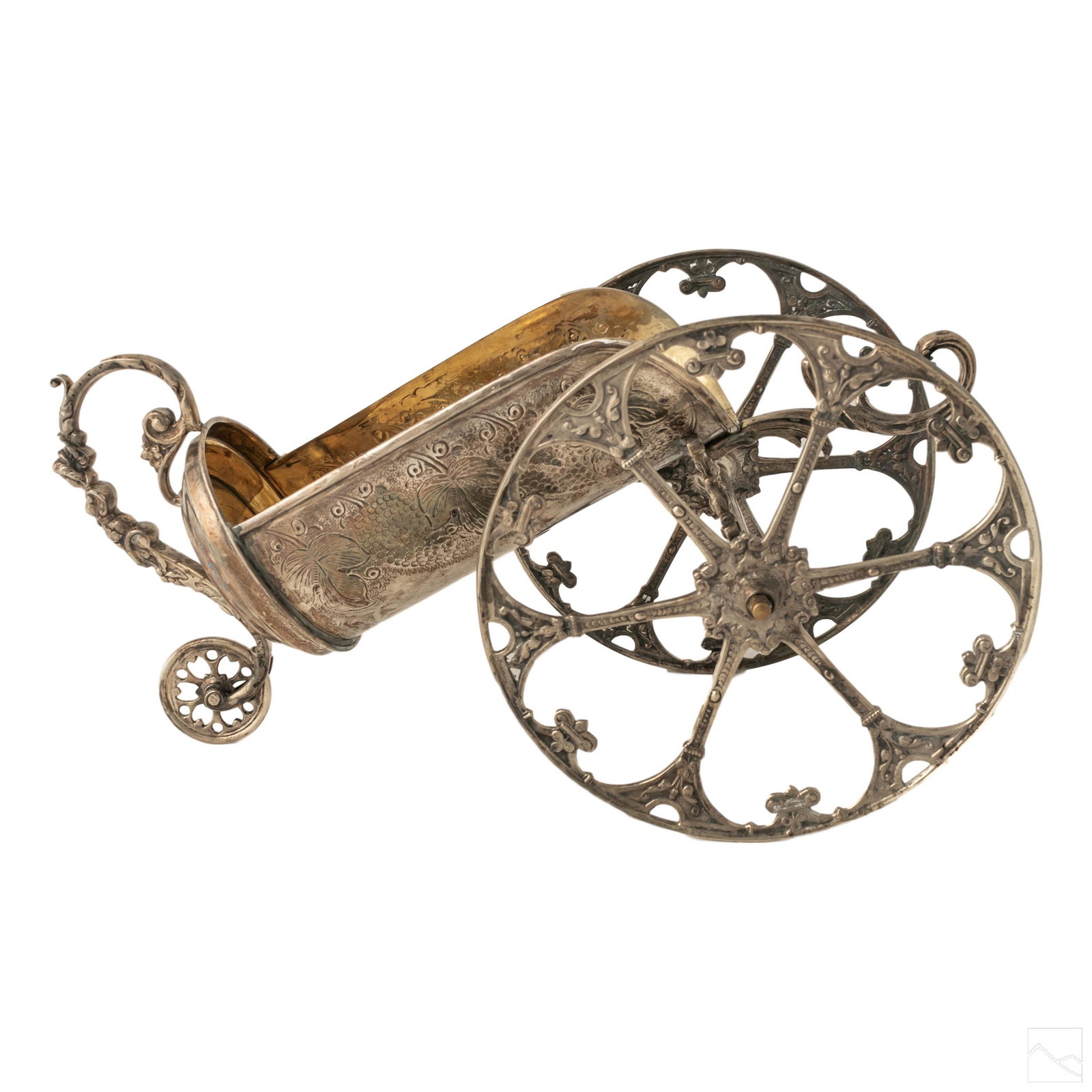 900 Silver Wheeled Wine Bottle Caddy Cart 1278g: Ornate vintage 900 silver wine bottle caddy with three wheels. Features baroque motif with handle and embossed leaf design. Marked 900, SK at top trim of caddy. Total weight approximately 1278 grams. 