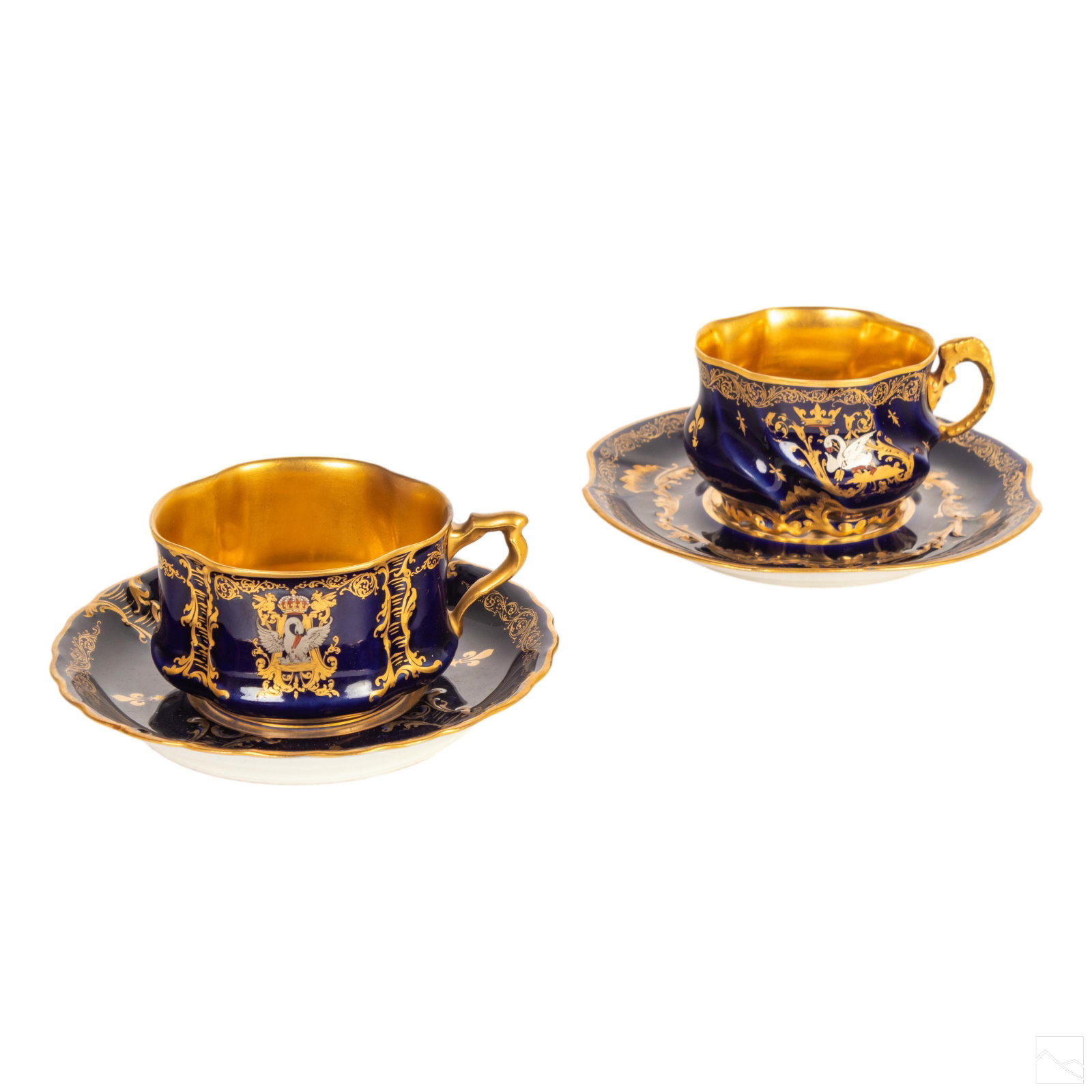 Herbiniere Tours French Porcelain Cups and Saucers: Two sets of Herbiniere Tours antique French Limoges style porcelain cups and saucers. Features cobalt and gold exterior with gilded accents and interior. Each piece signed. SHIPPING Hill Auction Galle