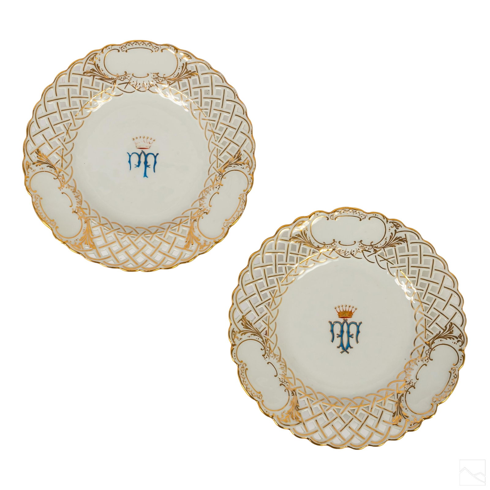 Meissen Armorial Reticulated Porcelain 9" Plates: Two plates crafted of fine quality German porcelain. Features a reticulated lattice gold gilt border with a hand painted armorial center design. Signed with Meissen crossed swords under glaze mark. SH