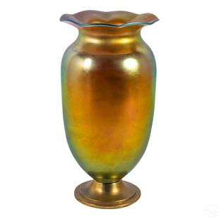 Steuben Style Gold Aurene Iridescent Glass Vase: Steuben vase with a scalloped rim and a deep iridescent Gold Aurene finish. No apparent markings, being sold attributed to Steuben. SHIPPINGHill Auction Gallery will offer in-house continental USA shi