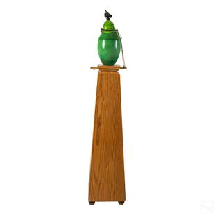 Marshall Hyde 20C Modern Studio Art Glass Urn Vase: Marshall Hyde (American, born circa 1953). Studio emerald green art glass lidded urn vase. Resting on custom wood obelisk stand featuring a bronze element of a closed fist thumbs up finial. Strings