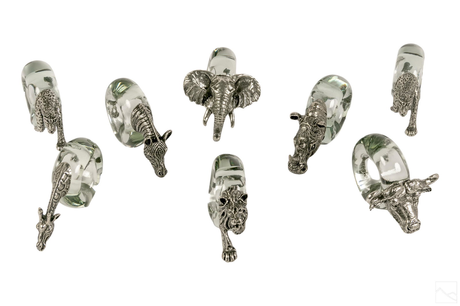 Makoulpa African Animal Pewter Glass Napkin Rings: Collection of eight (8) whimsical serviette napkin holders. Crafted from hand blown glass, with pewter details of South African wild life, which include a Lion, Giraffe, Elephant, Rhinoceros and two C