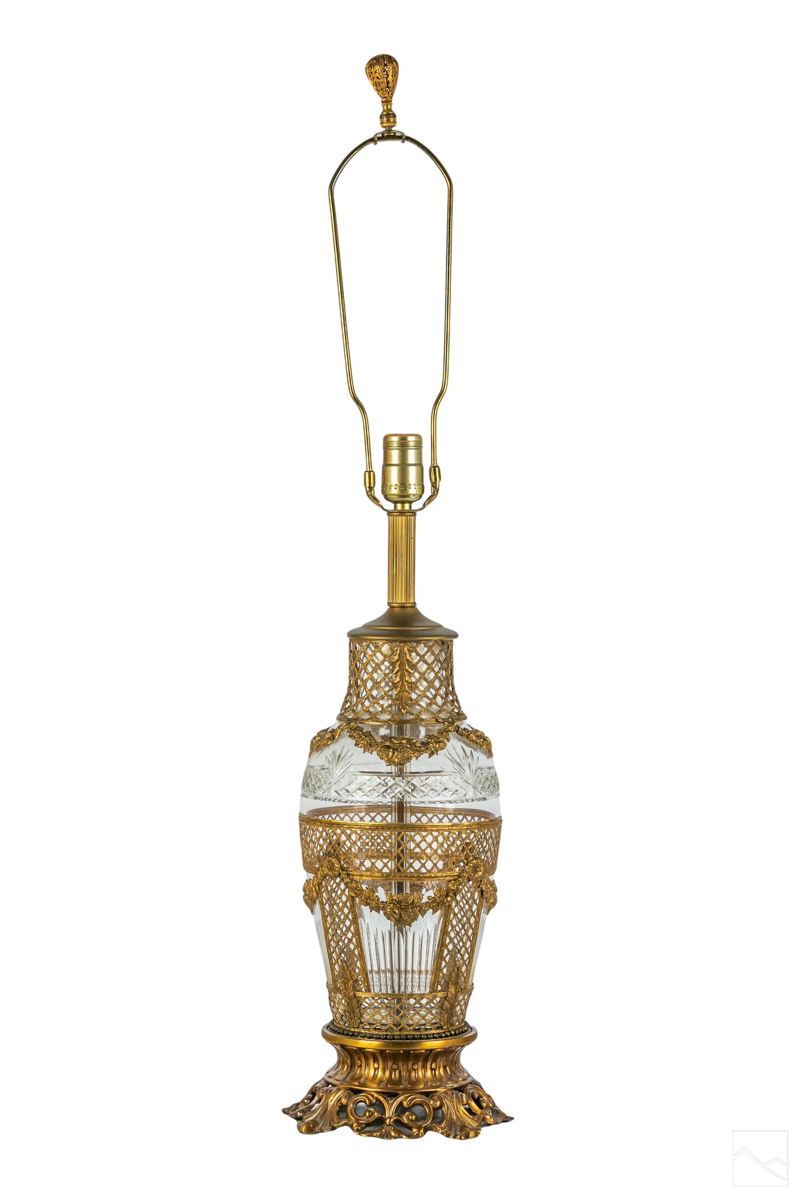 Ornate Crystal Brass Filigree Overlay Floral Lamp: A crystal body lamp with brass floral filigree overlay. Set in brass base. Lamp electric has not been tested. No apparent signature. Procured from a Palm Beach Island Estate. Dimensions: 22 X 7 X 7 in