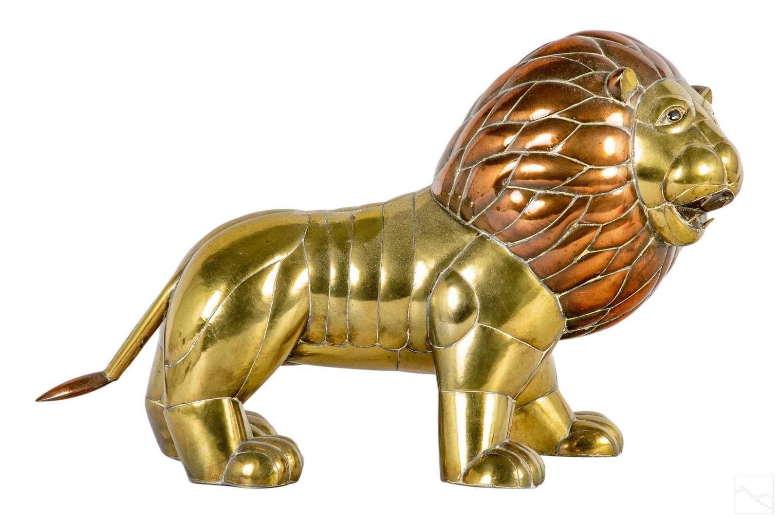 Mixed Metals Lion Sculpture manner of Bustamante: 20th Century mixed metal sculpture in brass and copper. Modeled as a jungle cat lion with glass eyes. No apparent signature. Being sold in the style of Sergio Bustamante (Mexican, born 1949). Dimensio