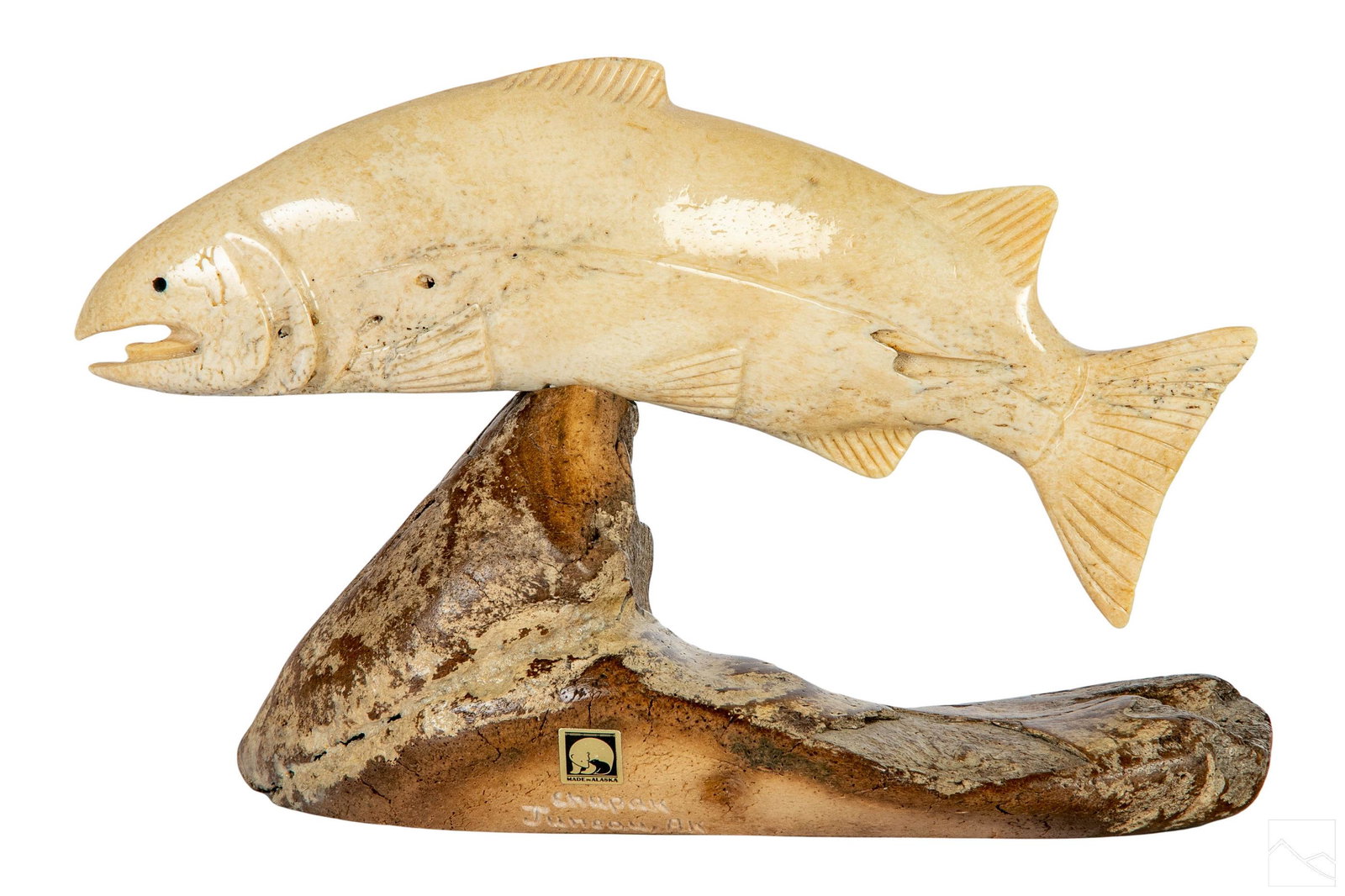 Chivly Chupak Native Alaskan Inuit Fish Sculpture: Chivly Chupak (20th Century Alaska) A carved Alaskan Native hand carved fossilized organic bone salmon fish sculpture. Signed CHUPAK on base. Juneau, AK. Bottom of base has informational tag. Dimensio