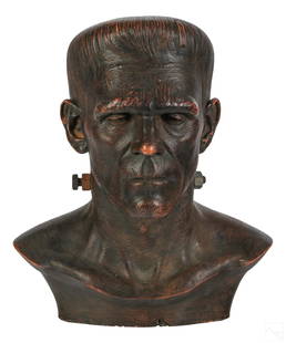 The Frankenstein Monster Hollywood Film Head Bust: Happy Halloween 2022 Y'all. A realistic Frankenstein monster head bust. Mixed media sculpture comprised of plaster composition having a reddish bronzed surface pigment with two metal neck bolts. The