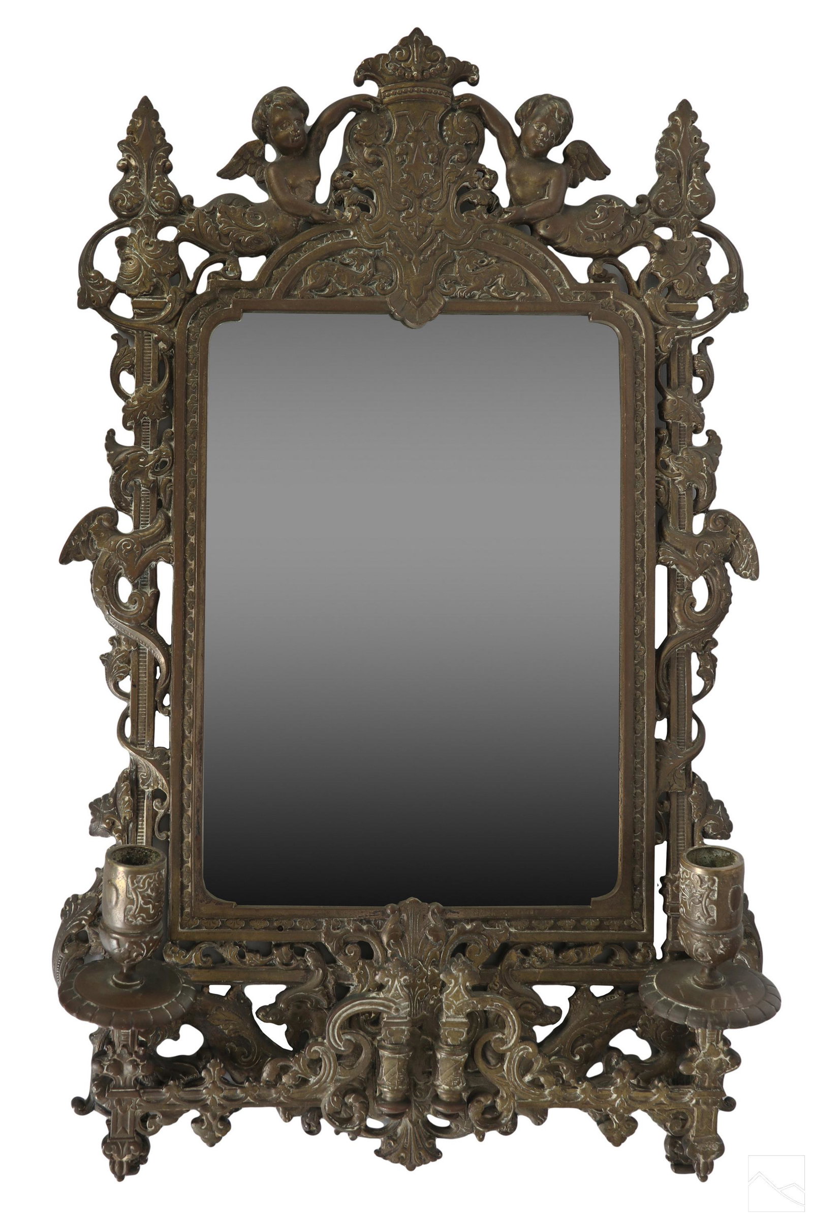 19C. Bronze Repousse Figural Mirrored Wall Sconce: An antique 19th Century bronze wall candle sconce. Ornate Neoclassical design with figural repousse putti angel framing a central rectangular mirror with dual hinged folding candlesticks at each end. 