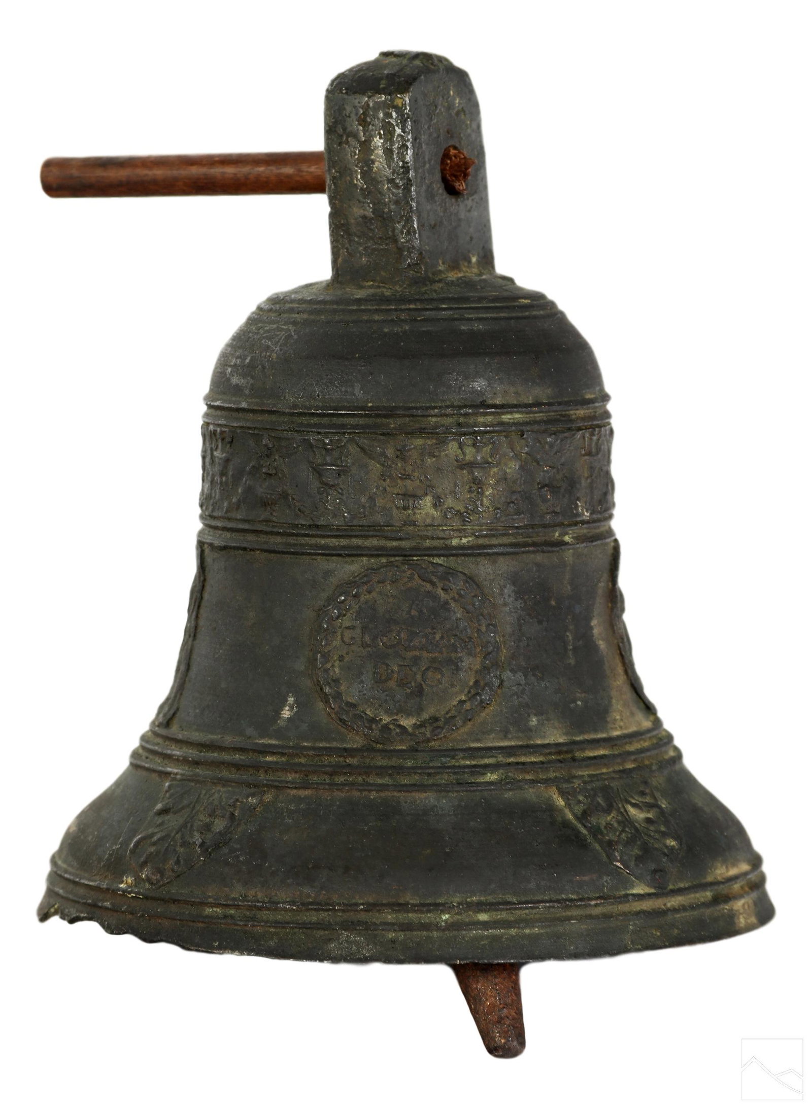 Mizner Estate Antique French Bronze Carillon Bell: An antique cast bronze French church carillon bell. Decorated with embossed figures, urns, winged griffins, and cherubs. Front of bell embossed DA CLO DEO. Iron clapper to interior. Retains partial ha