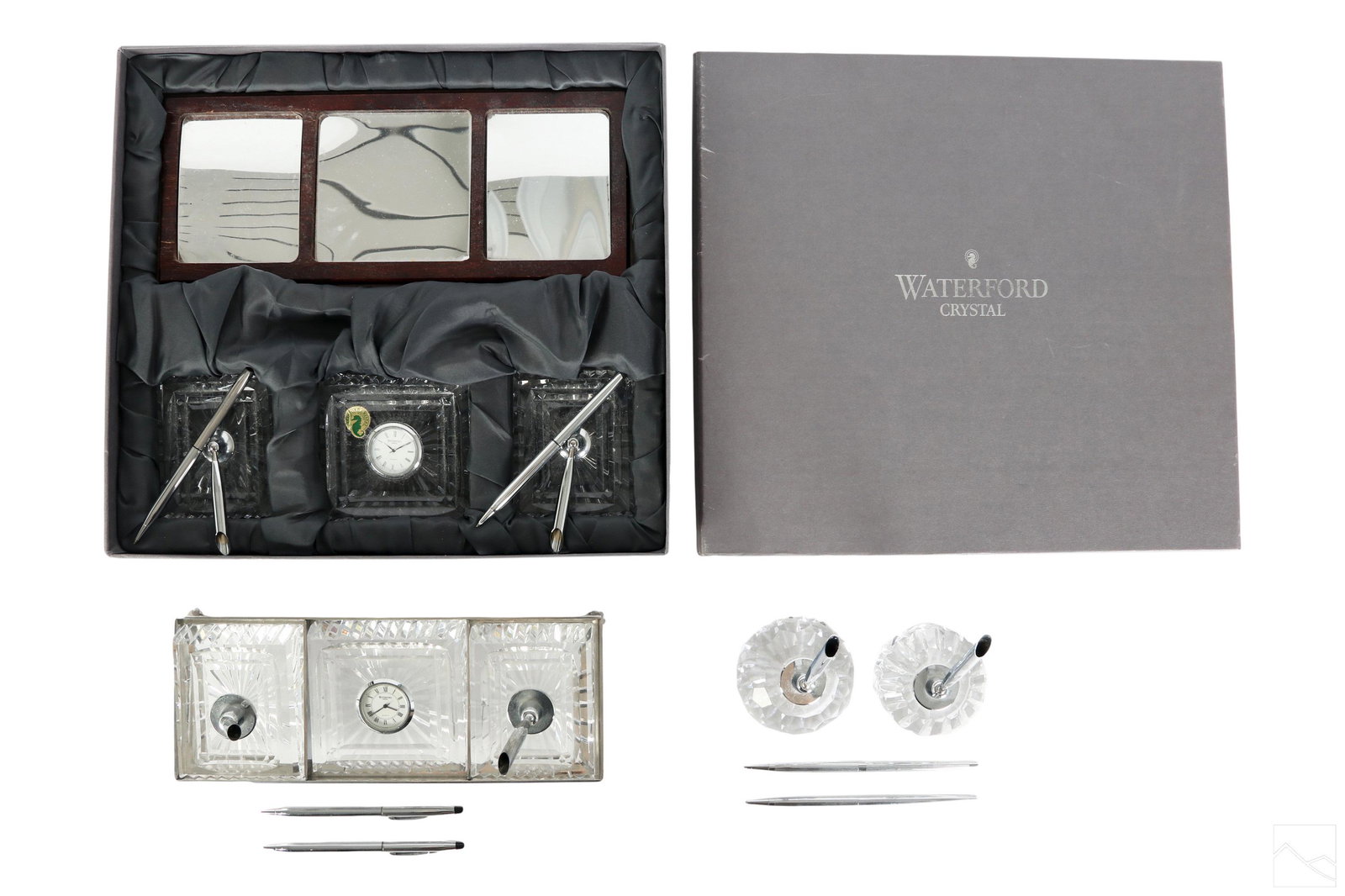 Waterford Irish Crystal Desk Sets and Accessories: An estate collection with two (2) complete Waterford Irish crystal desk sets and additional desk accessories. Includes: one (1) desk set with wood base stand, fitted rectangular crystal clock with WAT