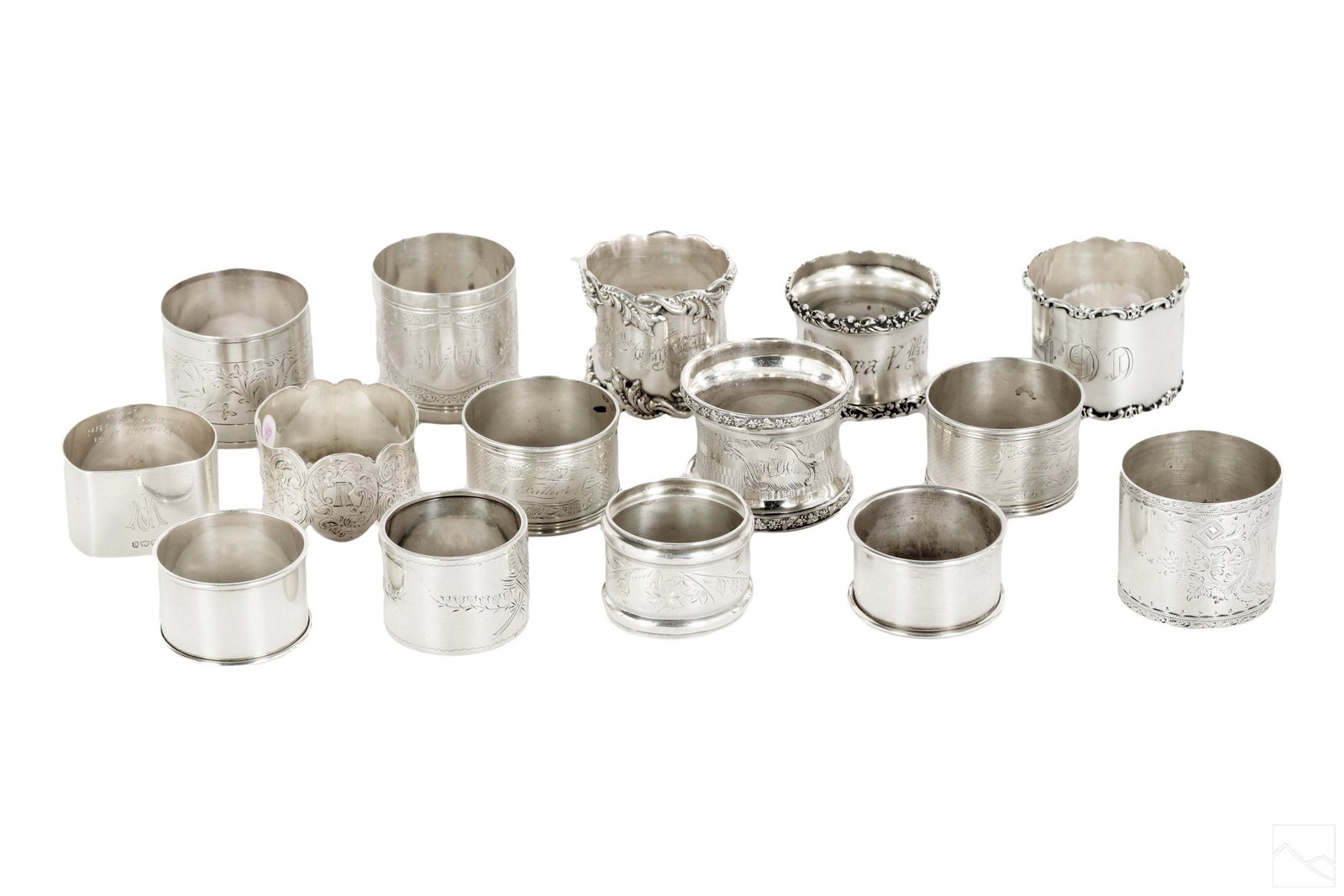 Sterling Silver Tableware Napkin Ring 15p LOT 425g: An estate collection of 15 sterling silver napkin rings. Elegant and ornate in various styles and manufacturers. All having monograms. Largest measures approximately 1.75" x 2" x 2". Total approximate