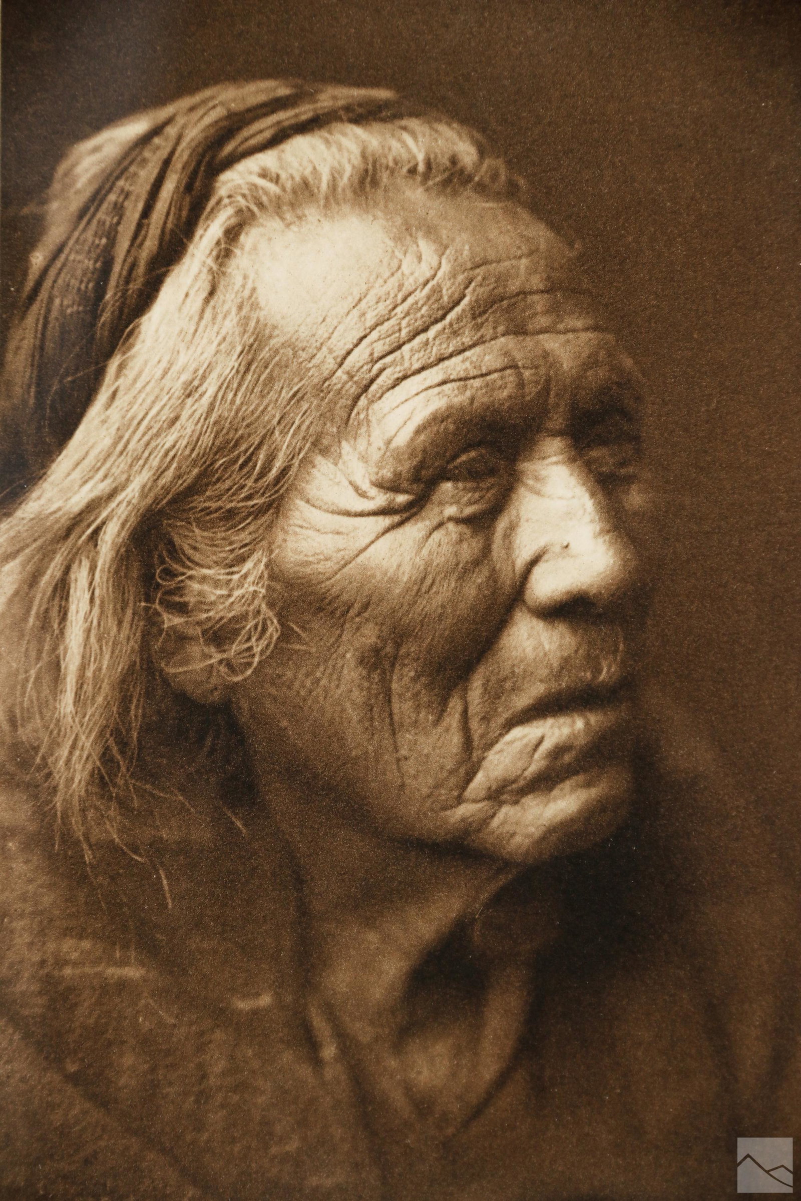 Edward Curtis 1868-1952 Medicine Man Photogravure: An antique Western Art photogravure photographic image on paper, by American West photographer and ethnologist Edward Sheriff Curtis (1868-1952). Titled "Navajo Medicine Man," depicting a male Native 