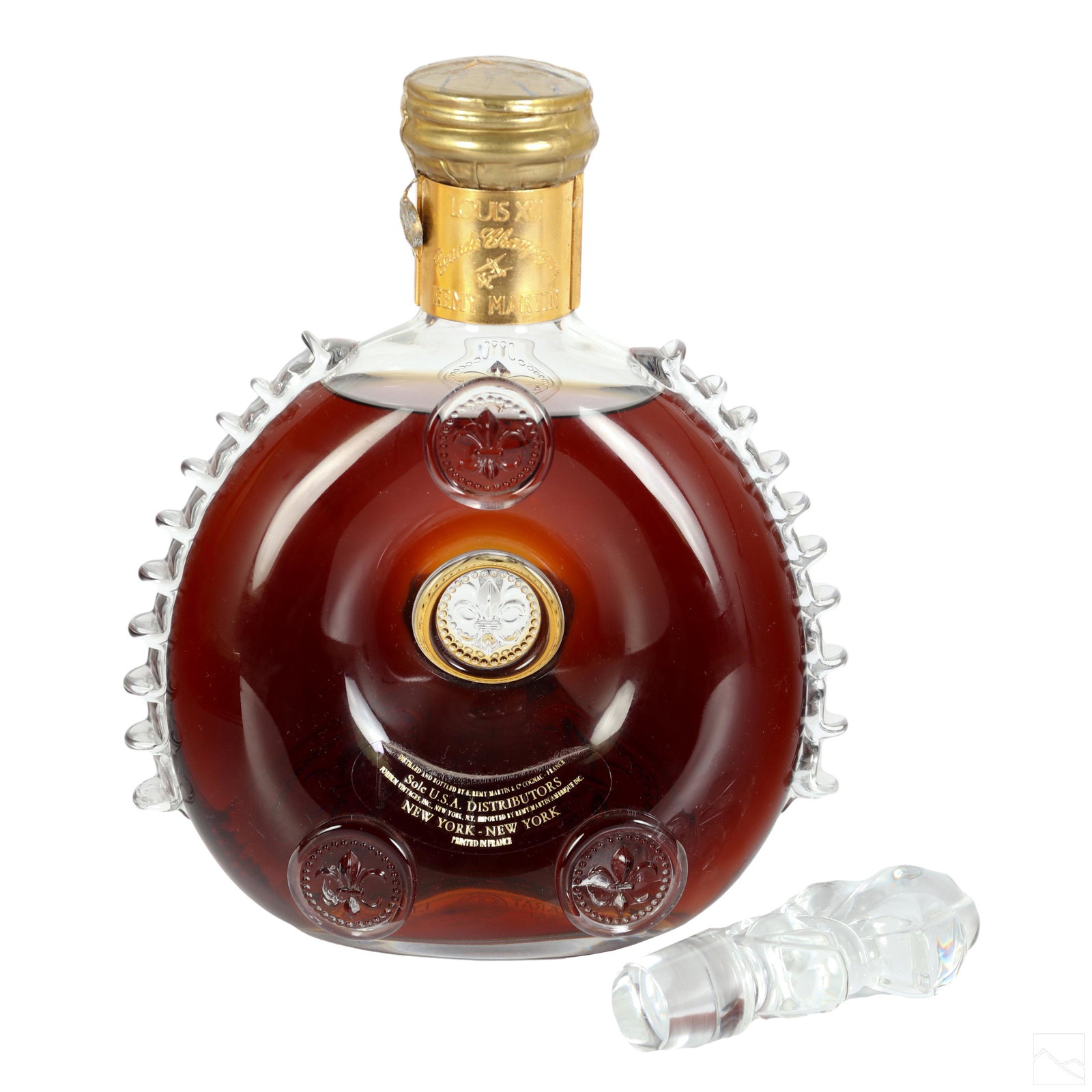 Remy Martin Louis XIII Grand Champagne Cognac 5508: A bottle of Remy Martin Louis XIII Grand Champagne Cognac No. C 5508 contained in a Baccarat French crystal carafe. Bottle is wax sealed with the glass fleur-de-lis stop fitted next to it. Certificate