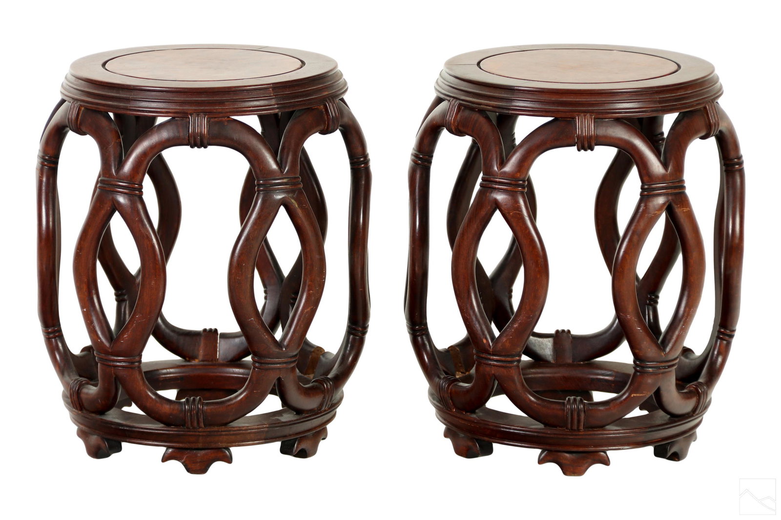 Chinese Carved Wooden and Faux Bamboo Drum Stools: A pair of Chinese carved wood drum stools. Undulating curves design mimic bamboo. Stained in rosewood finish. No apparent signature. Dimensions: 19 X 14 X 14 in. Condition: Good overall condition