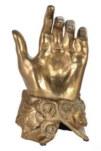 Anne Marie Slipper 1932-2018 Bronze Hand Sculpture: Anne Marie Slipper (Canadian, 1932-2018). A bronze statue. An abstract work modeled as a hand with curled fingers and outstretched index finger. Hand surrounded with floral cuff at base. Signed on