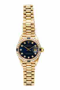 Rolex 18K Gold Diamond Sapphire Presidential Watch: A ladies Retro Rolex 18k gold Oyster President Datejust watch. Reference number 69088, produced circa 1994. 18k gold case and bracelet. Blue dial with diamond indicators. Factory Rolex bezel with diam