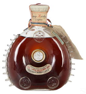 Remy Martin Louis XIII Baccarat Bottle SEALED 1951: A vintage unopened bottle of Remy Martin Louis XIII French cognac liquor, Circa 1951. Presented in a Baccarat French crystal art glass decanter. In sealed condition with the period green velvet