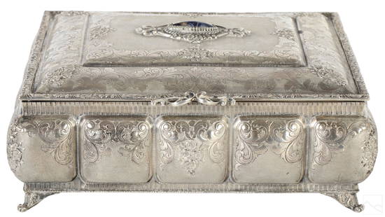 Italian Antique Sterling Silver Repousse Box 1670g: An antique 19th Century Italian sterling silver footed box. Ornate swirling floral repousse design, embellished with a lapis lazuli stone at center of hinged top. Stamped with Italia star, #117 MI,