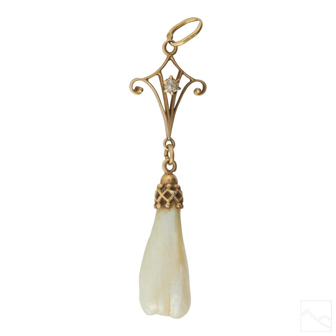 10K Gold Baroque Freshwater Pearl, Diamond Pendant: An antique 10k gold freshwater baroque blister pearl and diamond pendant. Features a baroque pearl set in 10k gold with diamond accent near the bale. Measures 1.75" long. Unmarked but tested 10k. Weig