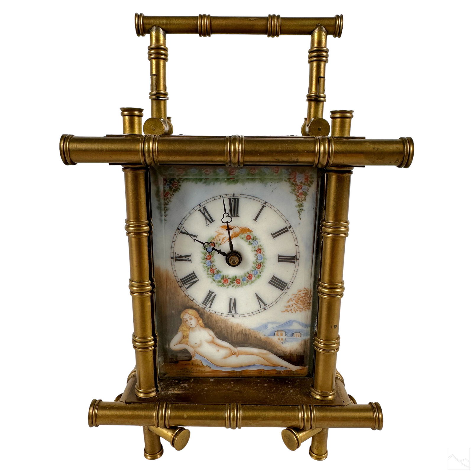 French Antique Neoclassical Brass Carriage Clock: An antique French brass carriage clock. Striking bamboo body and handle design with crystal covers to front dial face and back movement case. White enamel dial face with Roman numerals, and hand paint