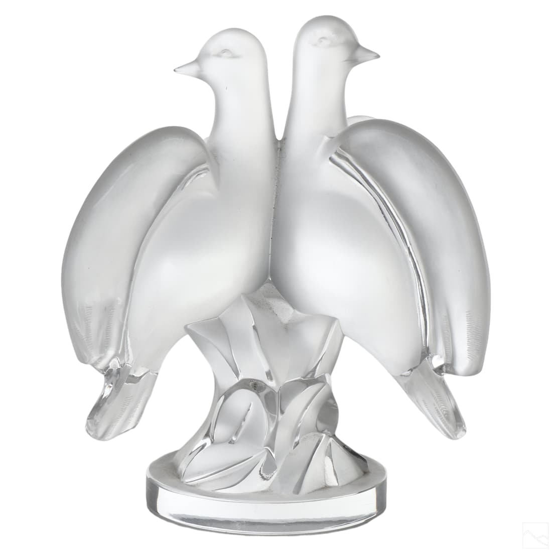 Lalique French Crystal Ariane Lovebirds Sculpture: A Lalique French crystal figurine in the Ariane pattern. A figural group produced in the Art Deco style depicting a pair of lovebirds or doves. Incised LALIQUE FRANCE to underside. Dimensions: 9 X 7 X