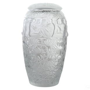 Lalique French Crystal Deco Angelique Covered Vase: A Lalique French crystal lidded floor vessel in the Angelique pattern. An Art Deco style palace size frosted amphora form body with silvered metal trim to rim, and decorated with encircling high