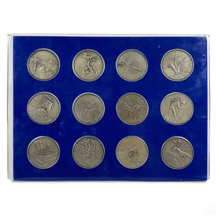 Salvador Dali 20C 12 Tribes of Israel Silver Medal: A set of 12 limited edition medallions designed by Salvador Dali (Spanish, 1904-1989). Each medallion crafted of fine .999 silver. Titled, "Homage to Israel, 1973" with a stunning Surrealist