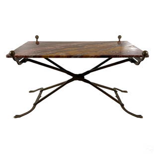 Industrial Hammered Iron and Marble Cocktail Table: A designer mixed media coffee, cocktail, or occasional table. Modernist Industrial design in patinated iron metal with sweeping rounded corners and surmounted by a rich red rectangular marble top. No