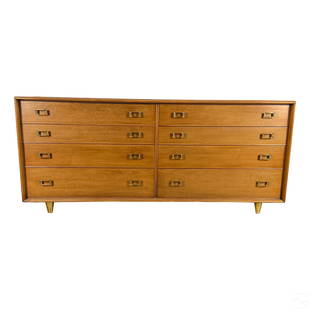 Johnson Paul Frankl Designer Walnut Double Dresser: A vintage wood double dresser chest of drawers designed for Johnson Furniture Company (Grand Rapids, MI) by Paul T. Frankl (1886-1958). Produced for the Emissary line, with refined Mid Century Modern